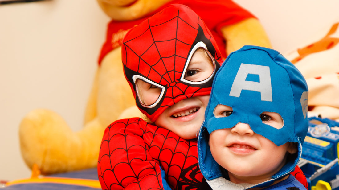 kids wearing superhero costumes