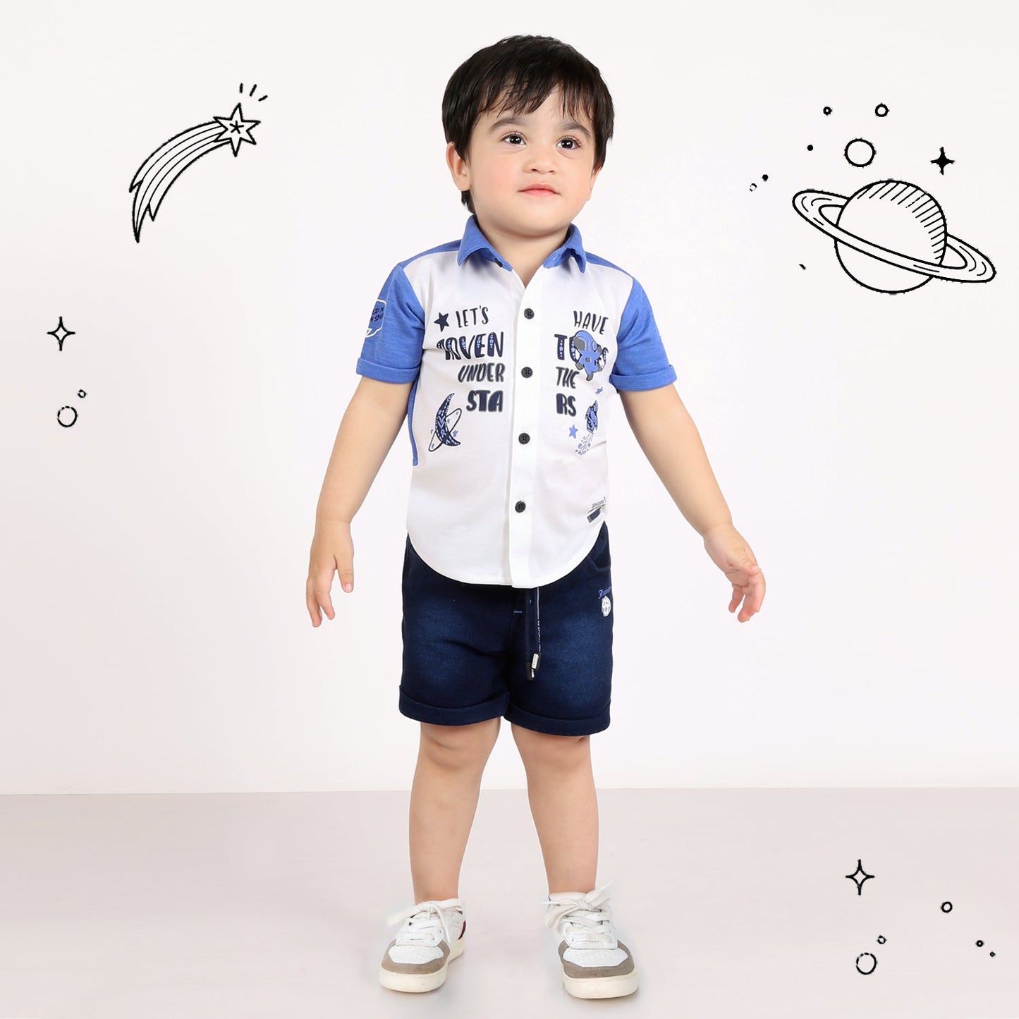 Tiny Trendsetter Alert! Playful Prints in Cool Shirt-Shorts Combo.