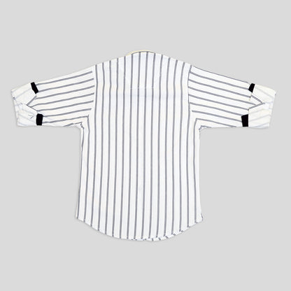 Stripe it Right: Elevate Casual Chic with This Fun, Striped Shirt!